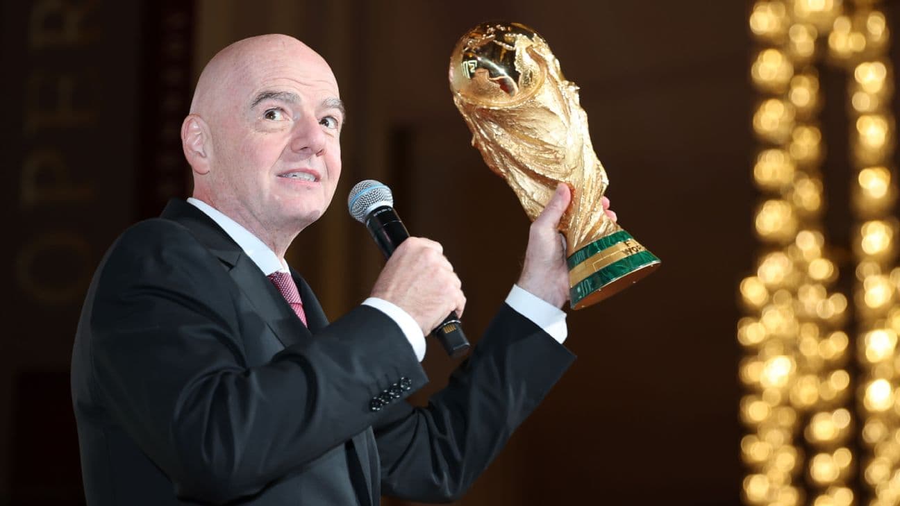 Gianni Infantino, President of FIFA, speaks with the FIFA World Cup Trophy during the VIP Welcome Reception ahead of the FIFA World Cup 2026 Official Draw at John F. Kennedy Center for the Performing Arts
 [1296x729]