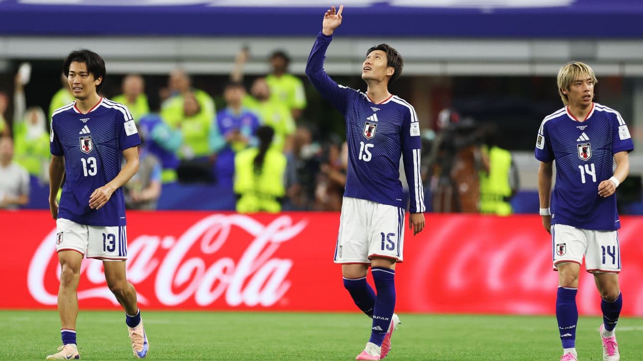 Daichi Kamada celebrates after his goal saw Japan draw with Netherlands.