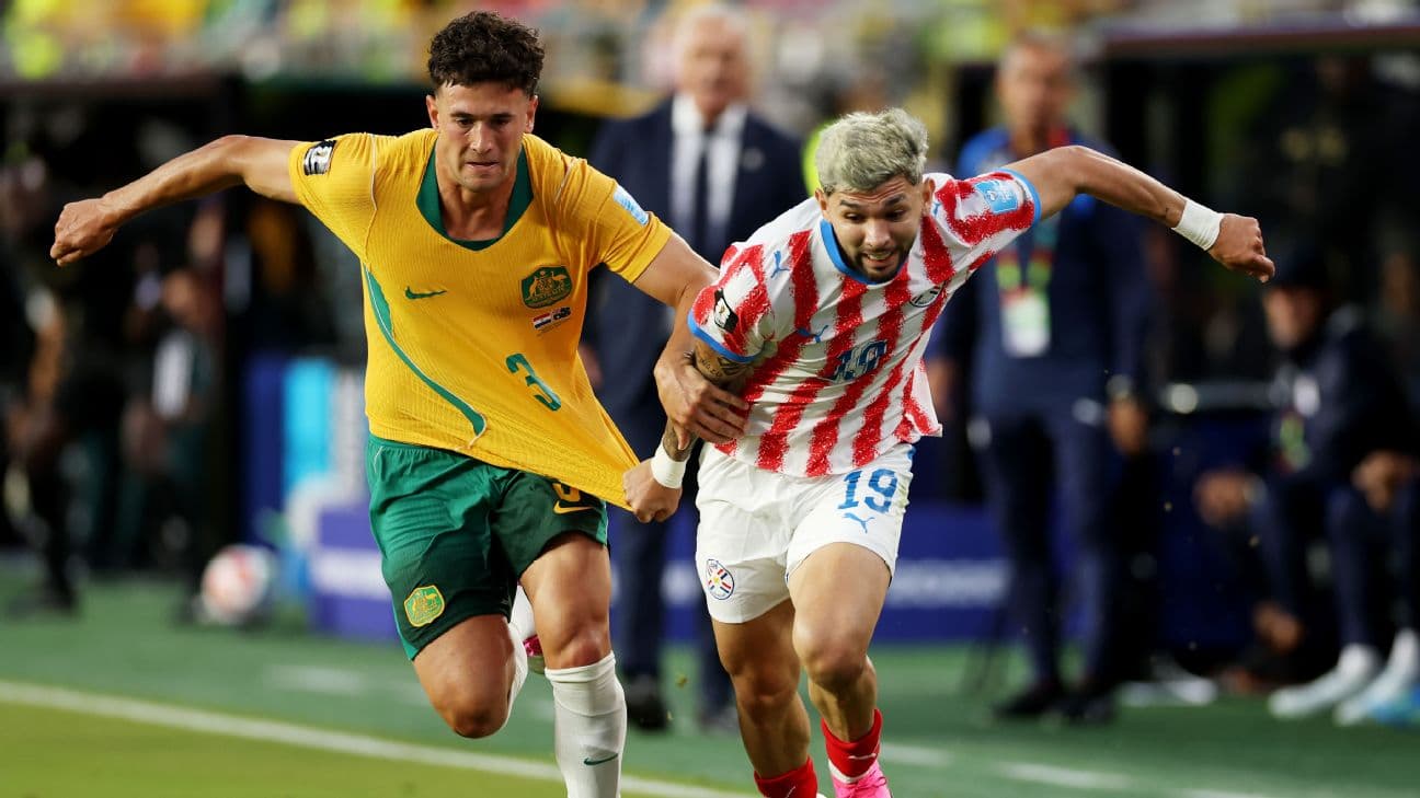 Paraguay's Julio Enciso and Australia's Alessandro Circati battle for the ball during the side's goalless draw.