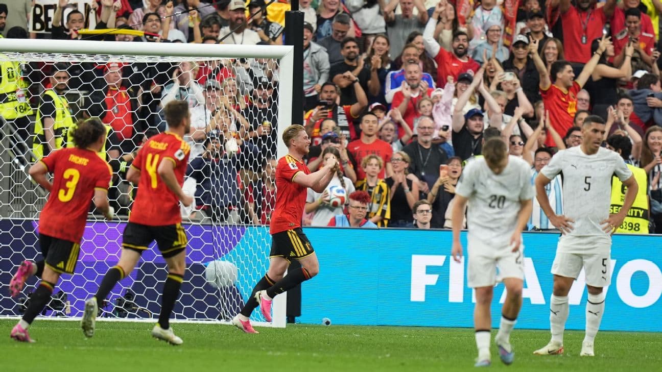 Belgium players celebrate after scoring a goal against New Zealand at the World Cup.